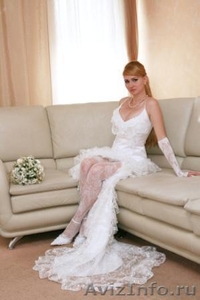 Продам красивое свадебное платье с разрезом от бедра - Изображение #1, Объявление #37849